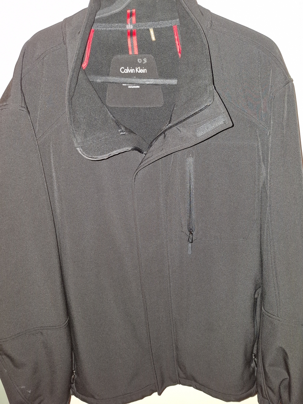 Calvin Klein Black Softshell Performance Jacket with Red Accent